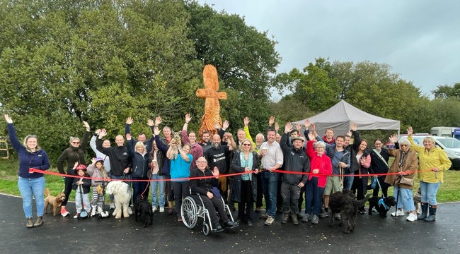 Visitors to Clyst Meadows join a ribbon-cutting ceremony to celebrate the opening of Clyst Meadows